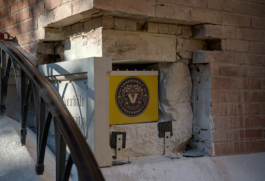 A new Vanderbilt time capsule, to be opened in the year 2174, was interred in the cornerstone of Kirkland Hall on Aug. 21. (Tim Gollins/Vanderbilt University)