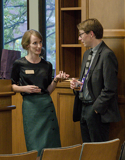 Special Collections and University Archives Curator of Manuscripts Mary McSparran (left) speaks with a Wodehouse Society member. (Tim Gollins/Vanderbilt)